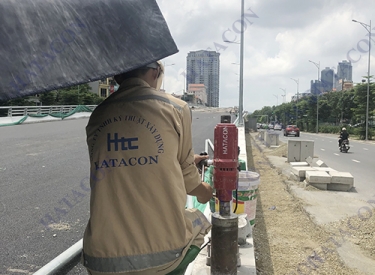 Khoan rút lõi bê tông cầu vượt  Nguyễn Văn Huyên, Cầu Giấy, Hà Nội